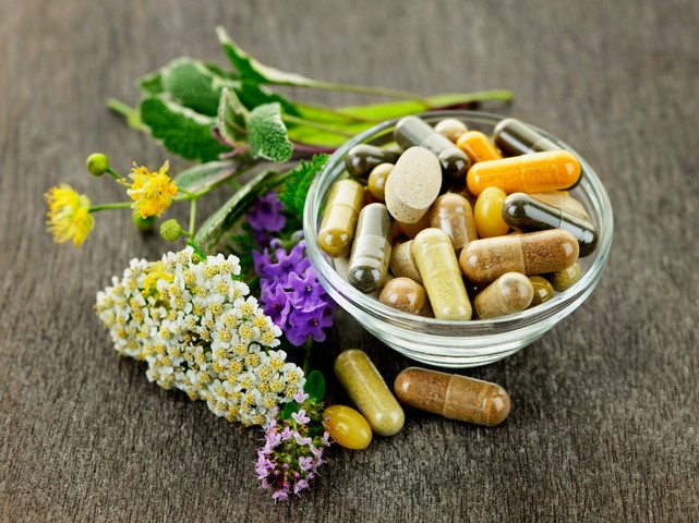 nutrition supplements and vitamins in a bowl